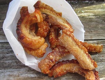 Pork scratchings by Claire Thomson